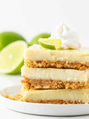 Stacked key lime pie bars.