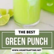 Green punch in a glass with striped straw.