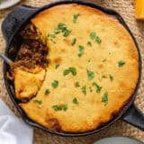 Tamale pie in a iron skillet.