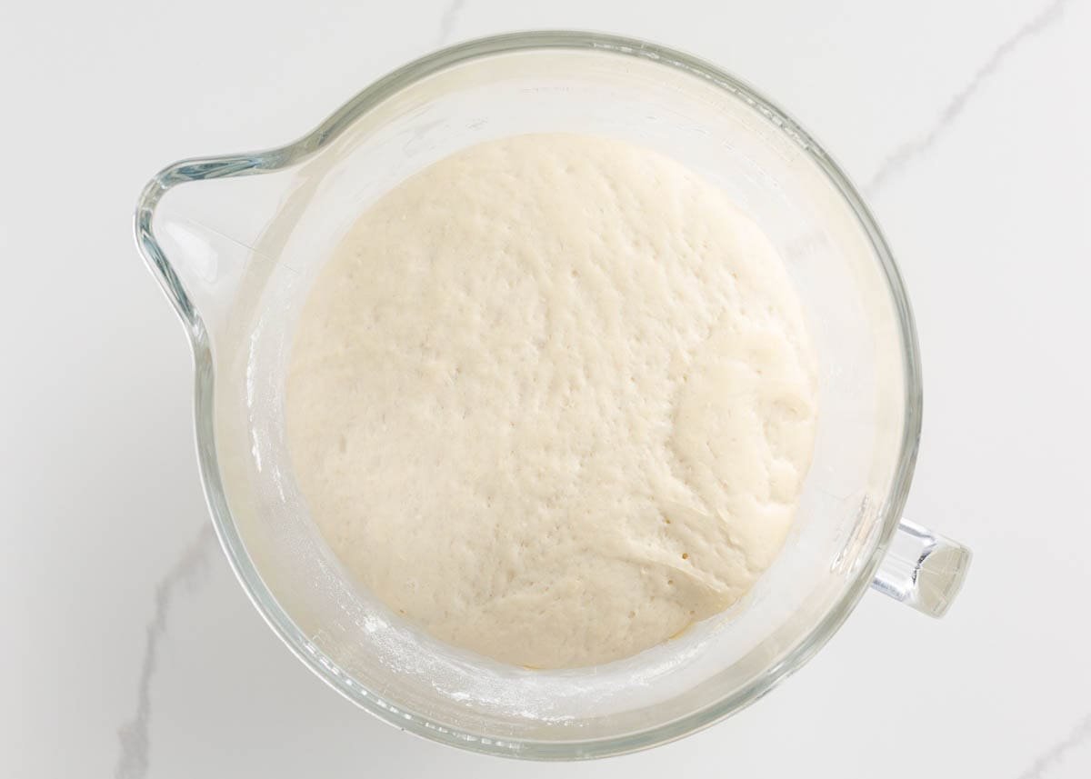 This easy Italian bread recipe is ready in just under 2 hours, including rise time. No bread maker is needed; all the kneading is done in a stand mixer, making it easier than you think! Italian bread dough.