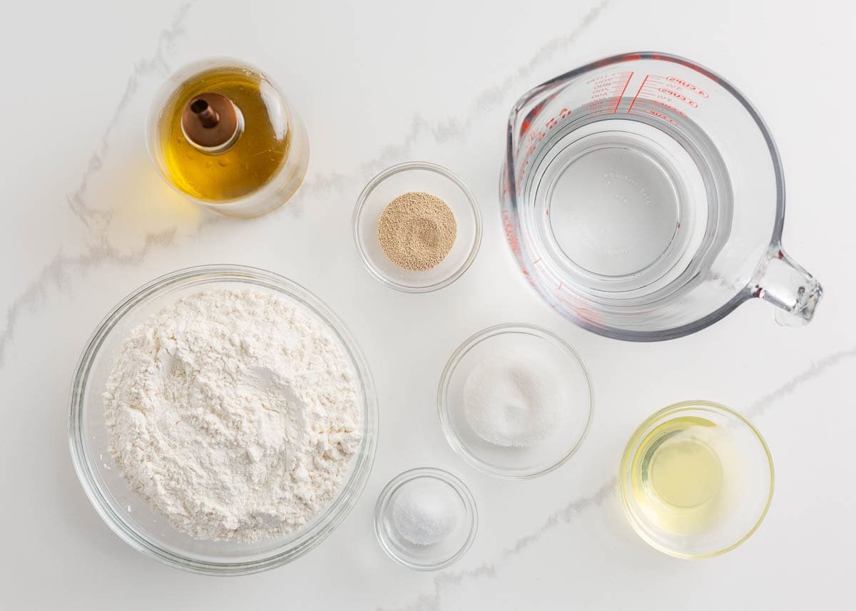This easy Italian bread recipe is ready in just under 2 hours, including rise time. No bread maker is needed; all the kneading is done in a stand mixer, making it easier than you think! Italian bread ingredients.