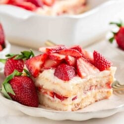 A slice of strawberry tiramisu on a plate.