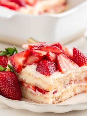A slice of strawberry tiramisu on a plate.