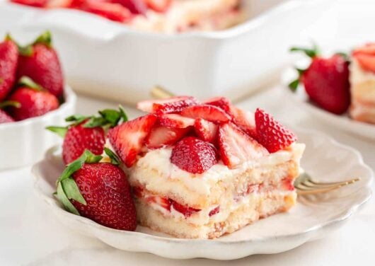 A slice of strawberry tiramisu on a plate.