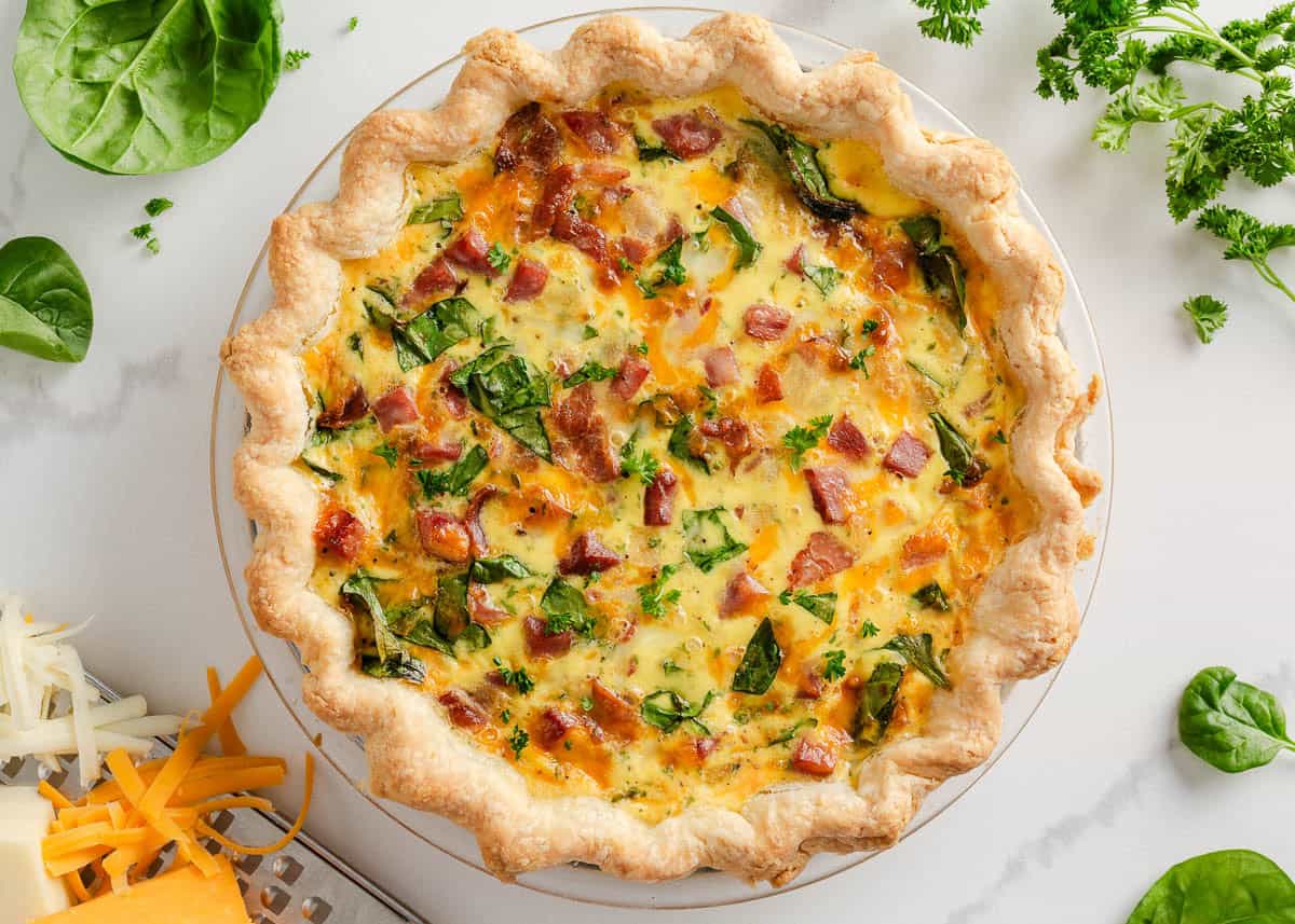 Baked ham and cheese quiche on the counter.