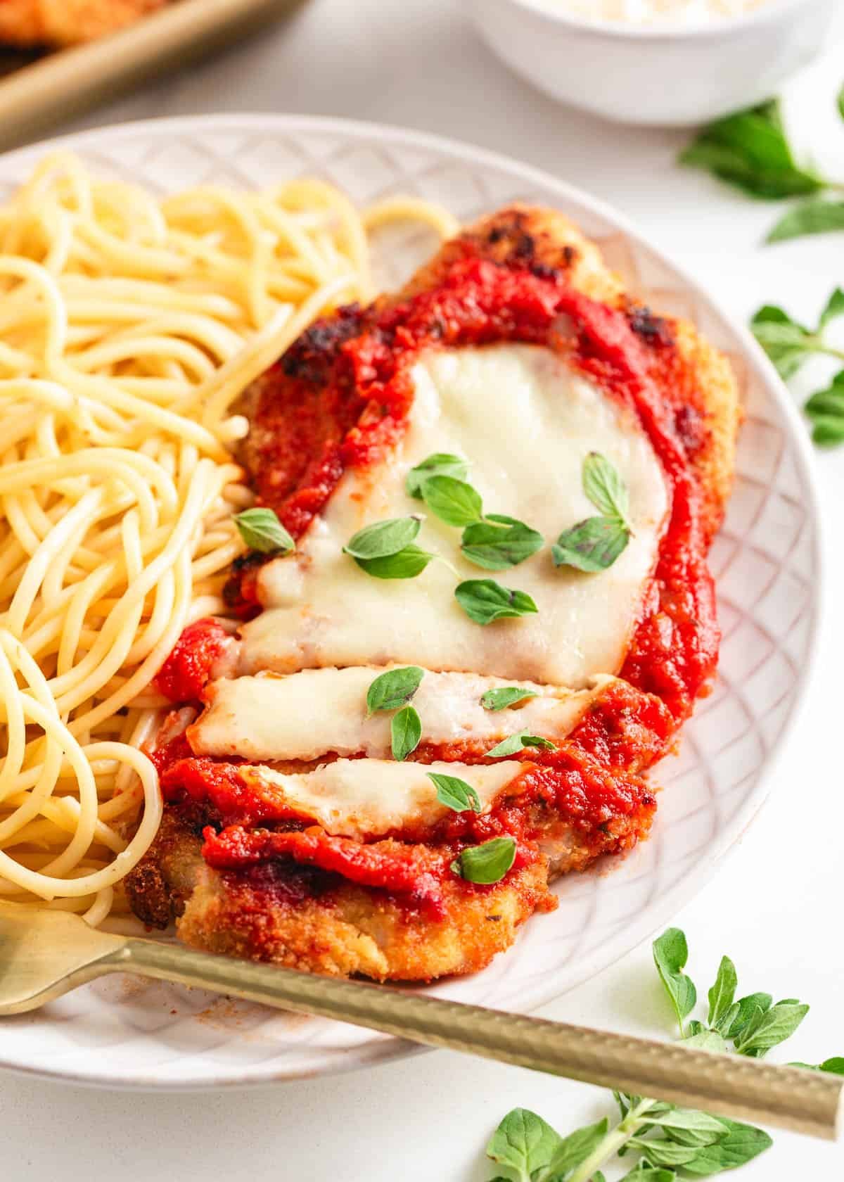 Baked chicken parmesan recipe with noodles.