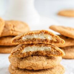 A stack of four cheesecake cookies on the ocunter.