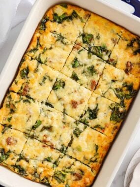 Sliced breakfast casserole in baking dish.