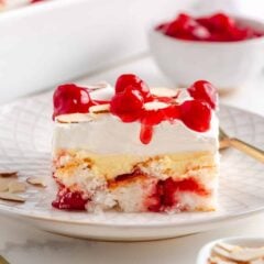 A slice of heaven on earth cake on a plate.