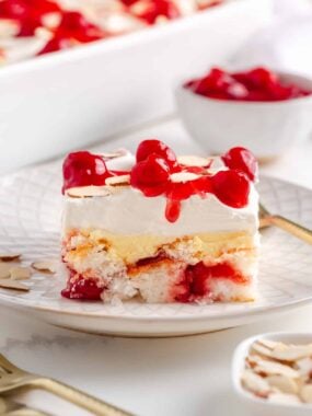 A slice of heaven on earth cake on a plate.
