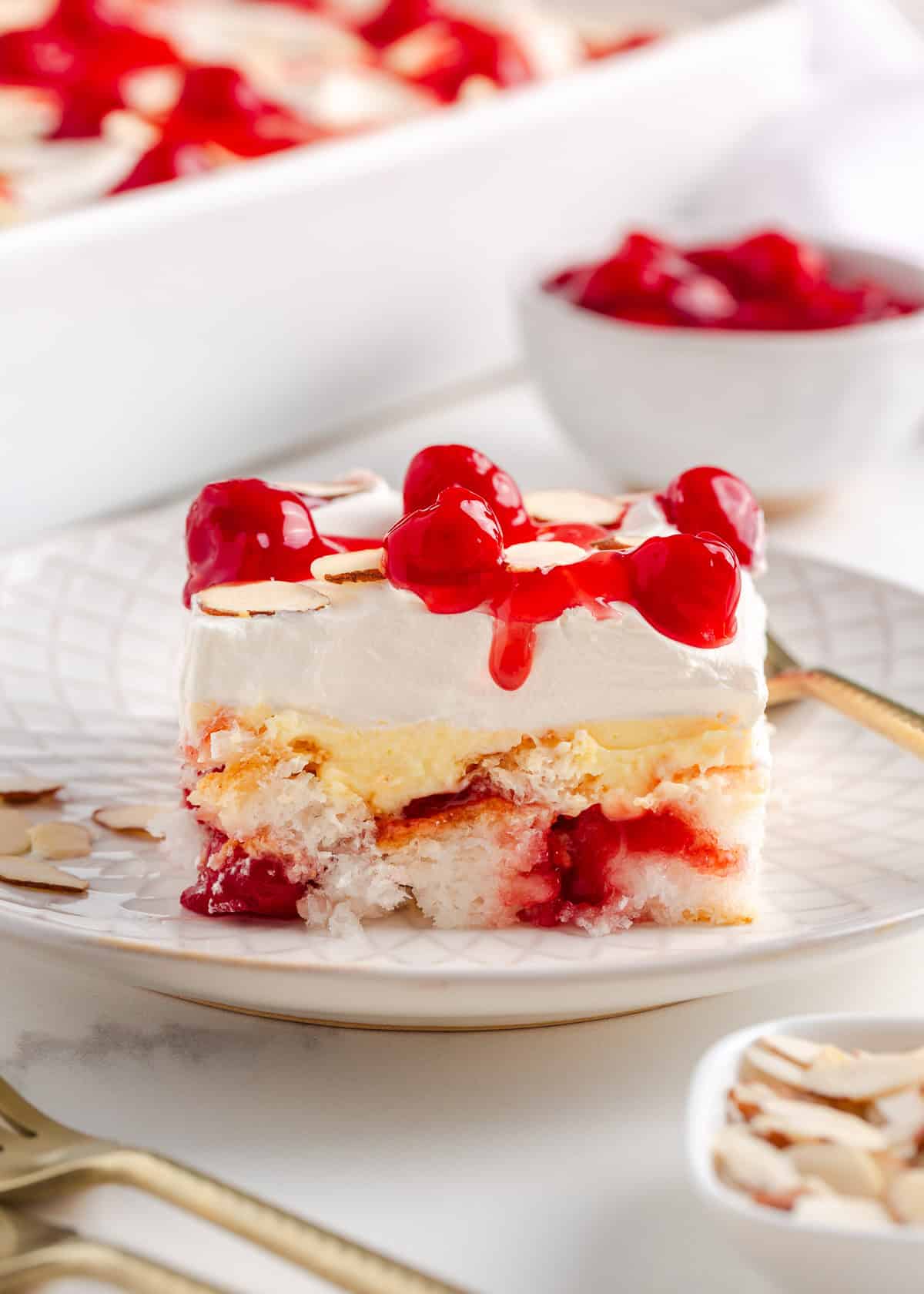 A slice of heaven on earth cake on a plate.
