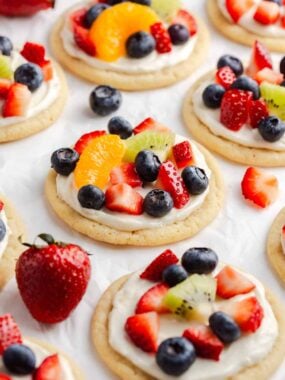 Fruit pizza cookies on the counter.