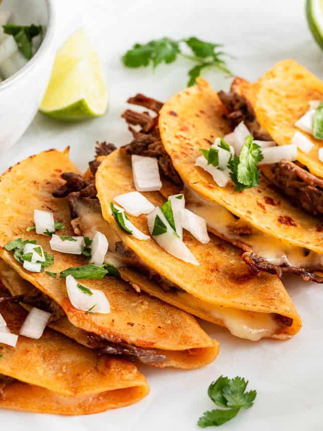 Beef birria tacos made with birria beef.