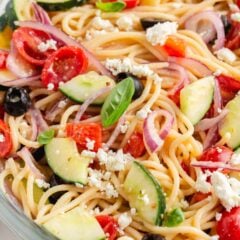 Close up photo of spaghetti salad in a bowl.