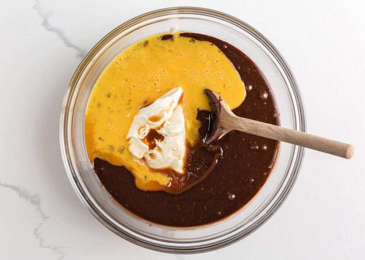 Stirring ingredients into Mississippi mud chocolate cake batter.