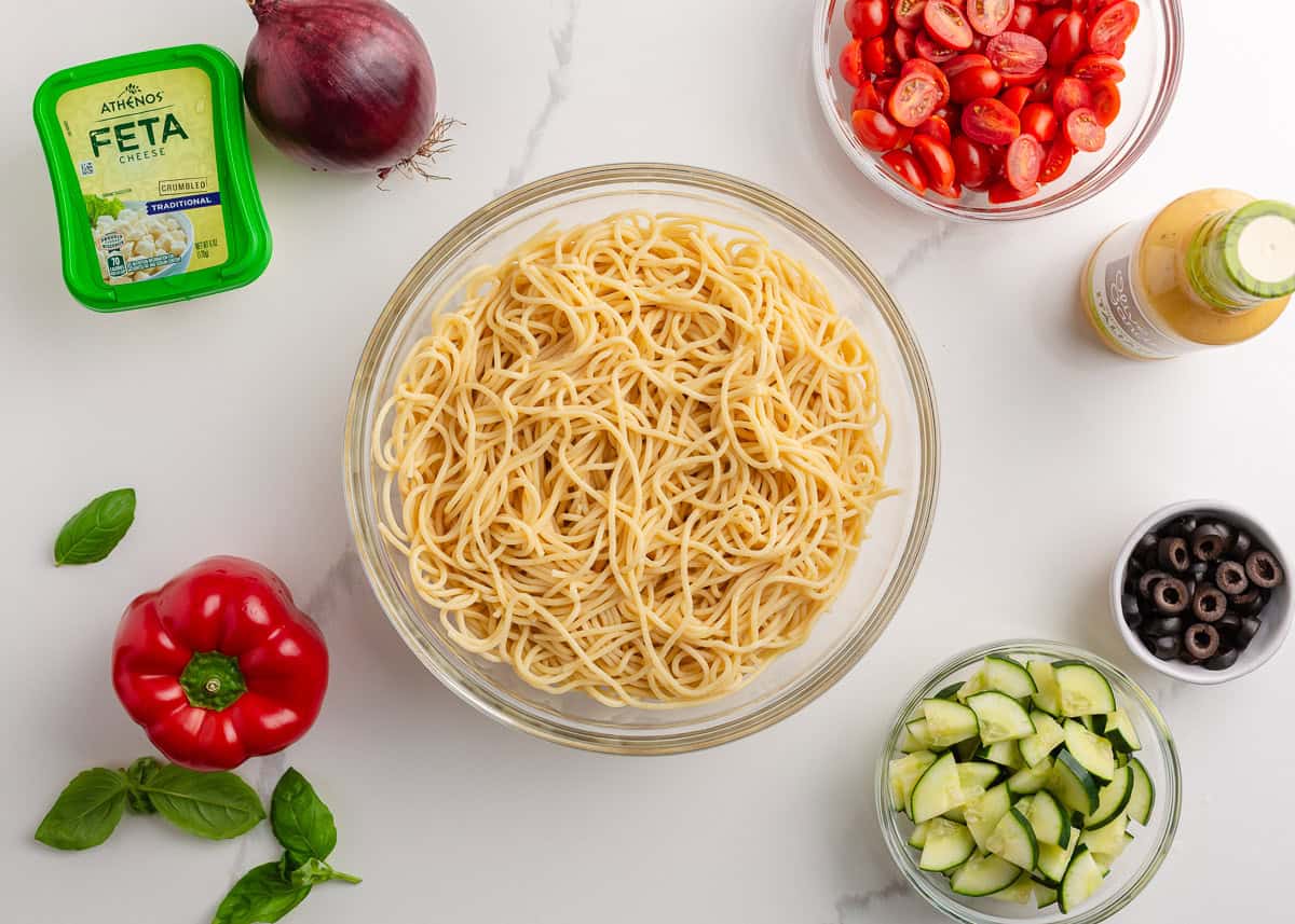 Cooked spaghetti pasta noodles on the counter.