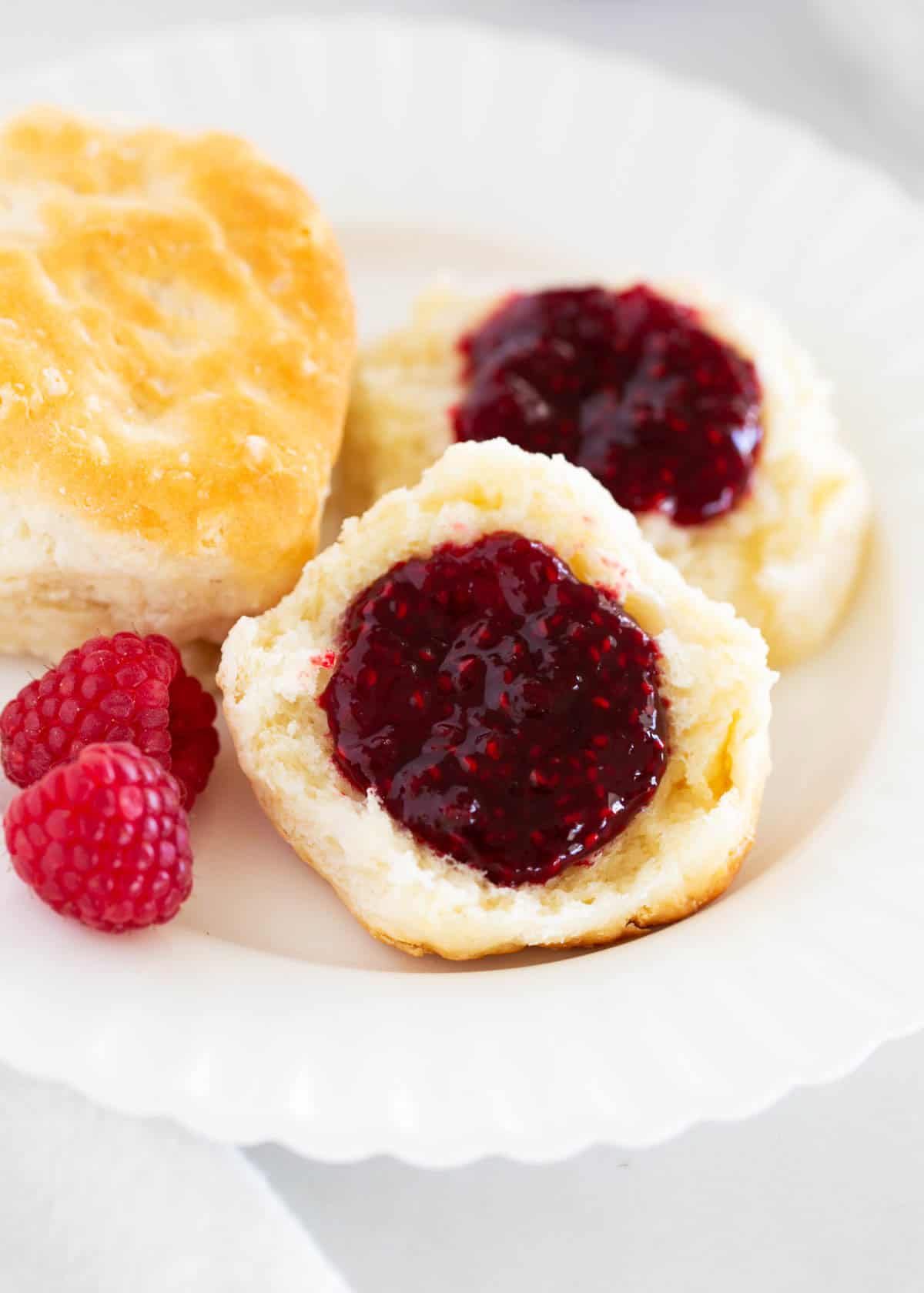Raspberry jam on a biscuit.