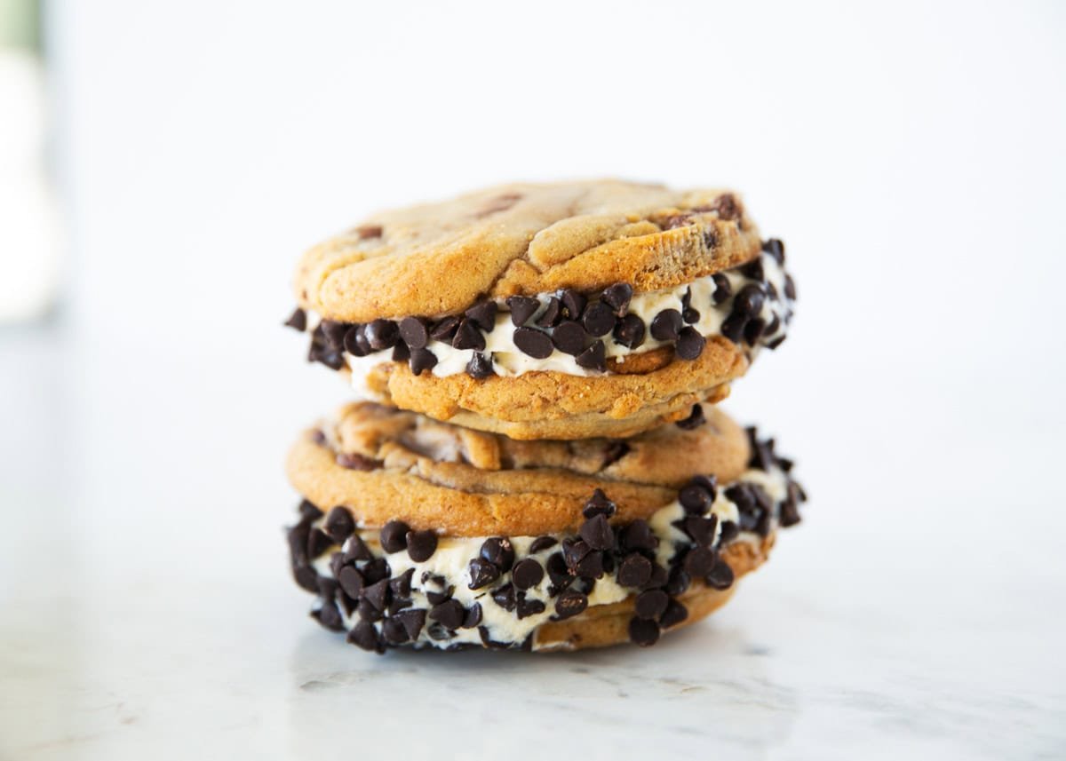 Creamy vanilla ice cream is sandwiched between two soft, chewy chocolate chip cookies to create the ultimate homemade cookie ice cream sandwiches the whole family will love. Two cookie ice cream sandwiches made with chocolate chip cookies and vanilla ice cream.