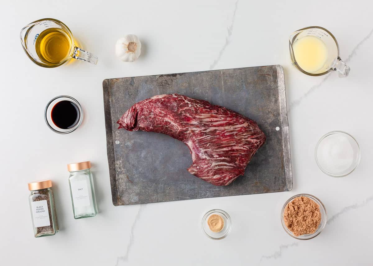 Tri tip and marinade ingredients on counter.