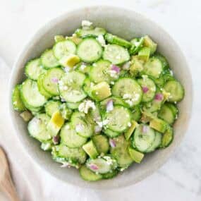 Cucumber avocado salad in a bowl.