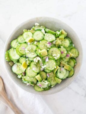 Cucumber avocado salad in a bowl.