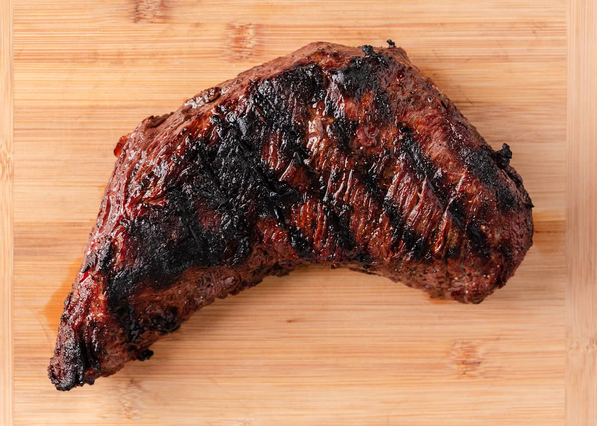 Tri tip resting on cutting board.