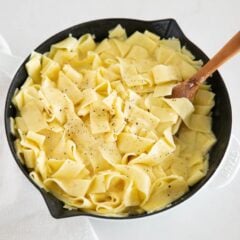Butter noodles in a skillet.