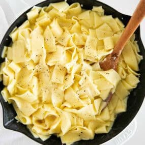 Butter noodles in a pan.