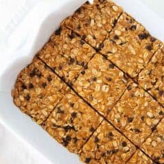 Overhead view of a full batch of no bake peanut butter oatmeal bars sliced into 12 squares.