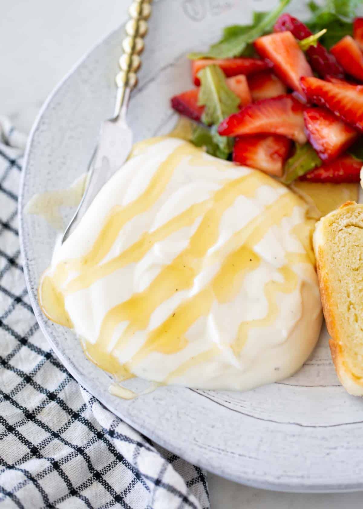 Whipped ricotta on a plate.