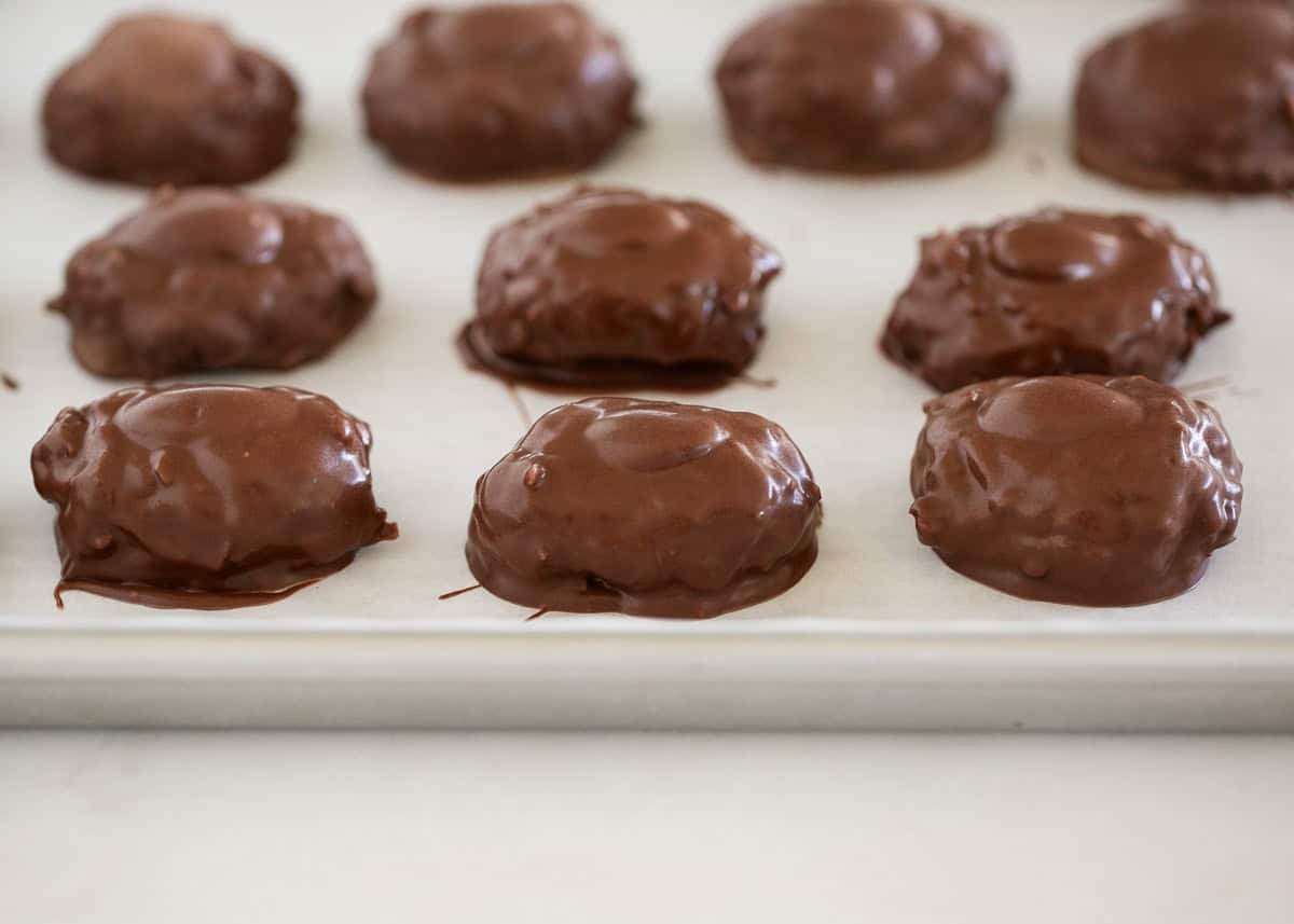 Showing how to make almond joys.