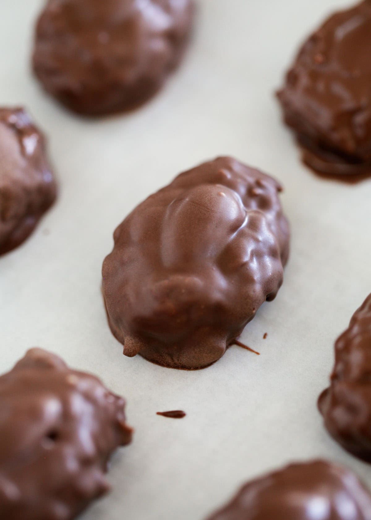 Showing how to make almond joys.