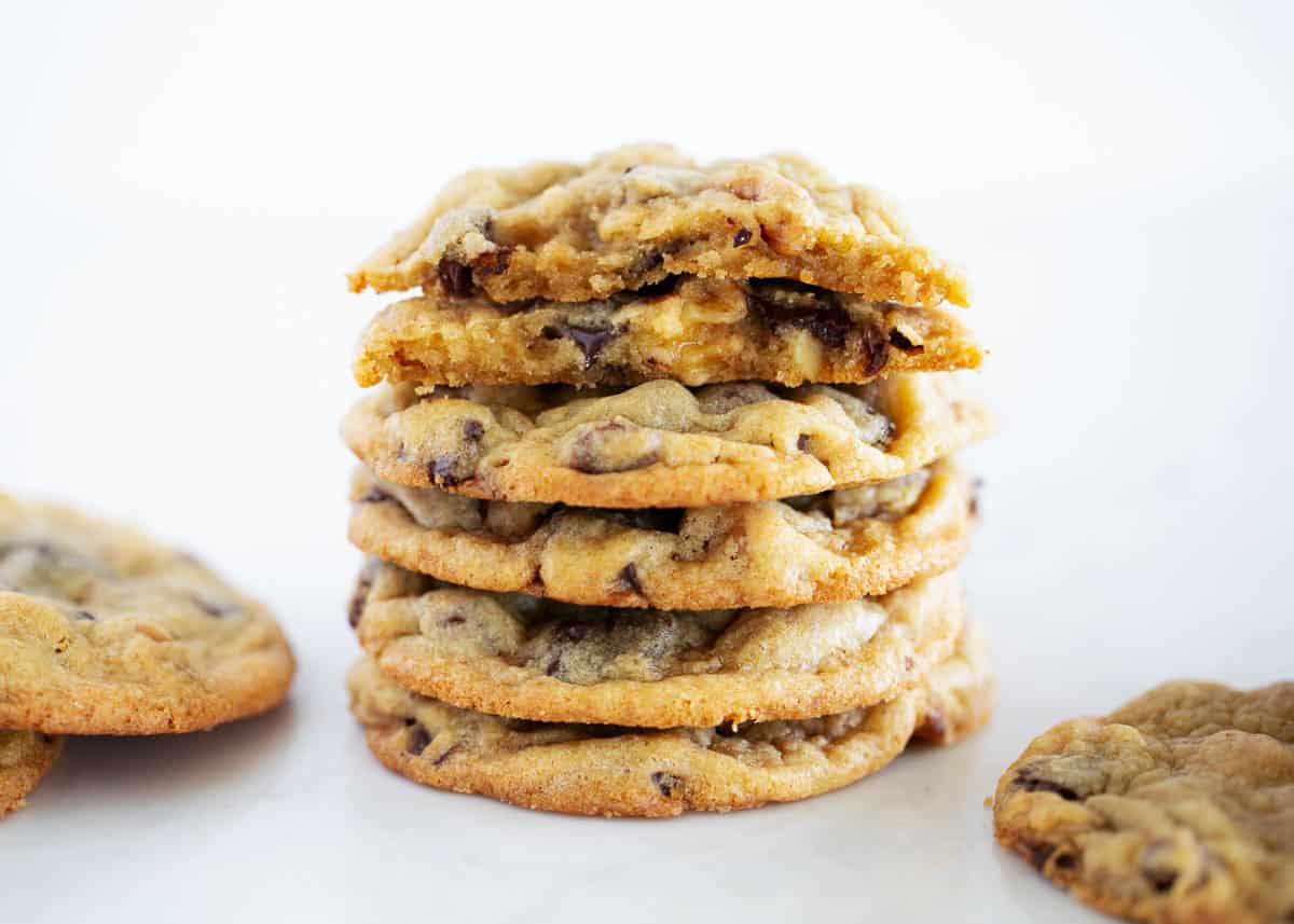 Chewy chocolate chip walnut cookies made with rich brown sugar, melty chocolate chunks plus chocolate chips, and crunchy walnuts. A bakery-style treat made at home! Stack of chocolate chip walnut cookies.