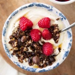 Chocolate granola and yogurt in a bowl.