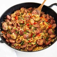 Easy sausage and rice skillet dinner cooked in one pot with smoked sausage, rice, and peppers.