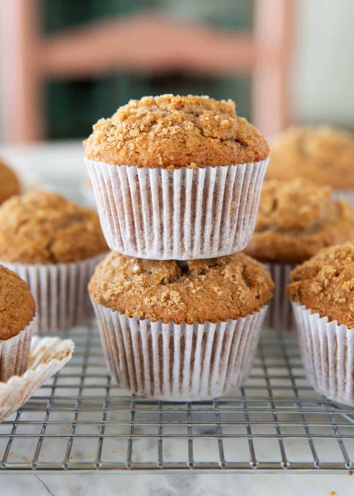 These classic bran muffins bake up soft, hearty, and lightly sweet. They’re a wholesome recipe perfect for a healthy breakfast or snack. Tall, bakery-style bran muffins stacked on a wire rack after baking.