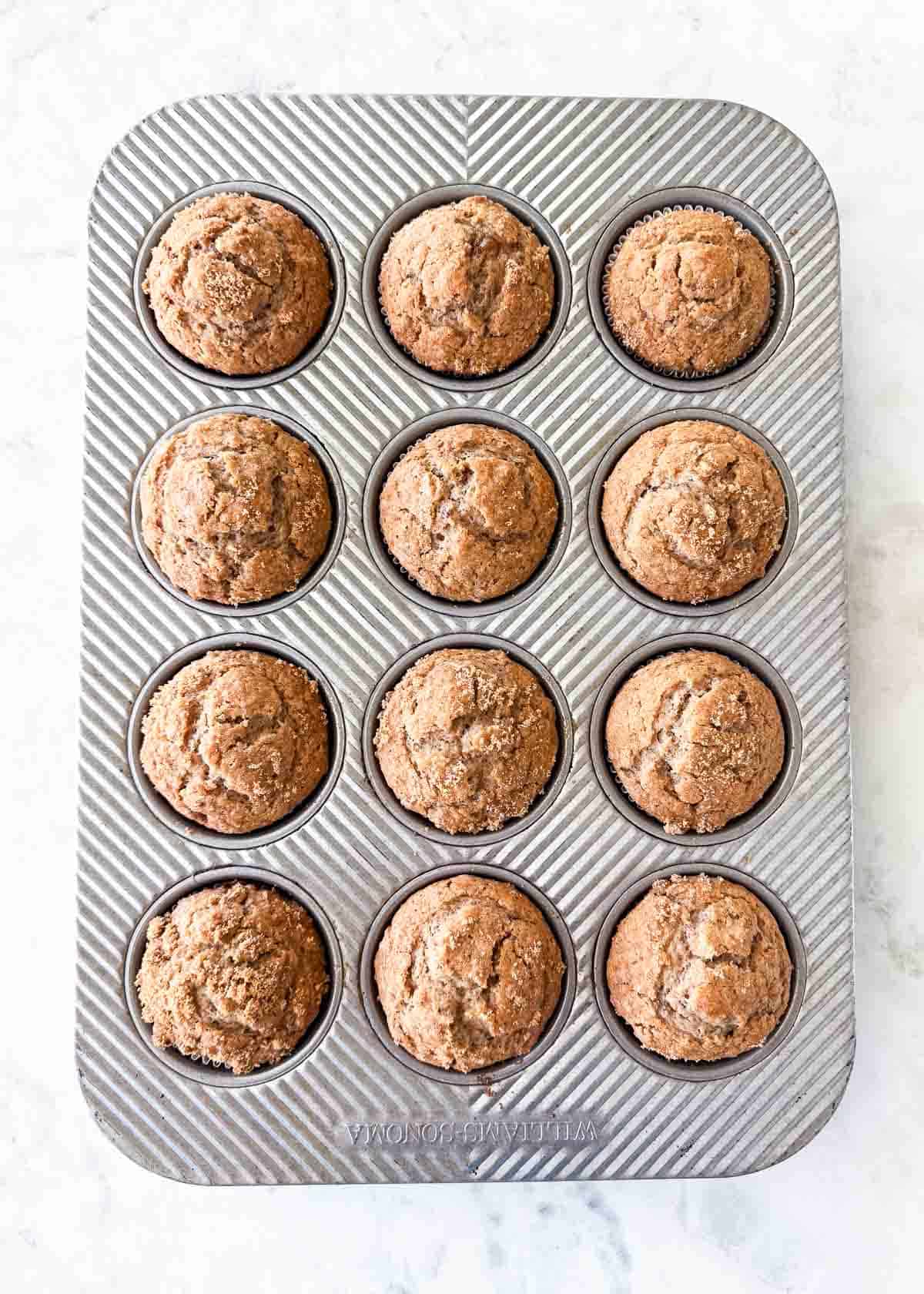 These classic bran muffins bake up soft, hearty, and lightly sweet. They’re a wholesome recipe perfect for a healthy breakfast or snack. Freshly baked bran muffins in a muffin pan with golden, domed tops.