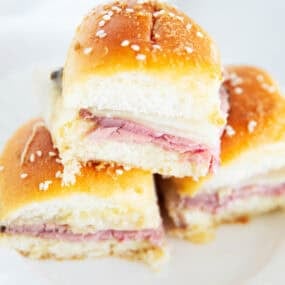 Stacked roast beef sliders.