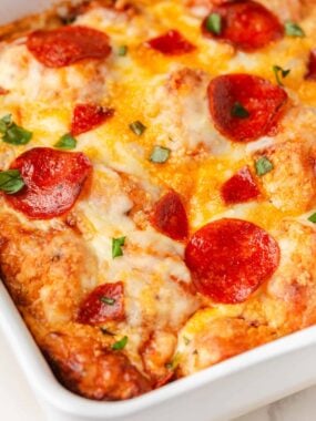 Close-up of pepperoni bubble pizza showing melted cheese and browned biscuit dough.
