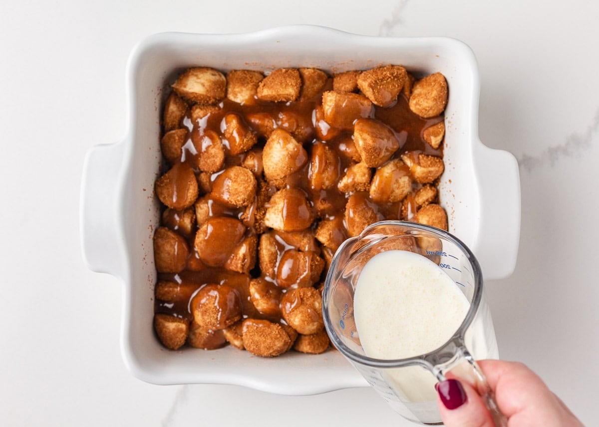 These easy cinnamon roll bites deliver soft, fluffy cinnamon sugar goodness in a bite-sized treat made with ready-made frozen dough. They're perfectly gooey for a sweet treat! Heavy cream poured over cinnamon roll bites to create a gooey texture.
