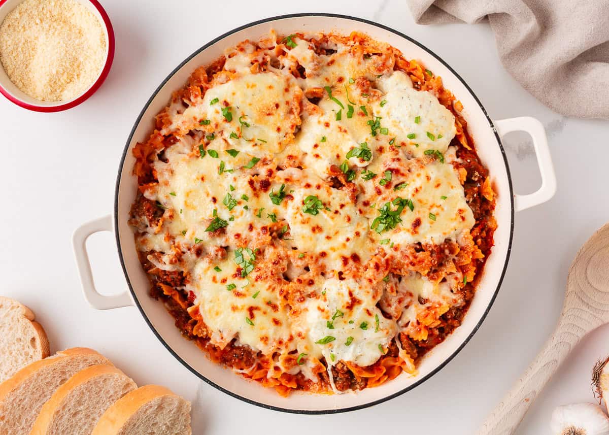 This easy one-pan skillet lasagna comes together on the stovetop in under an hour, with the same bubbly, saucy, cheesy comfort of the classic baked version. Finished easy skillet lasagna with melted cheese served in one pan for a family dinner.