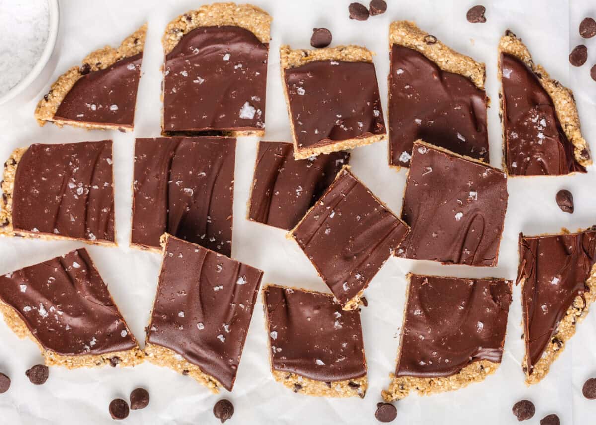 Cookie dough bark pieces topped with chocolate and flaky sea salt.