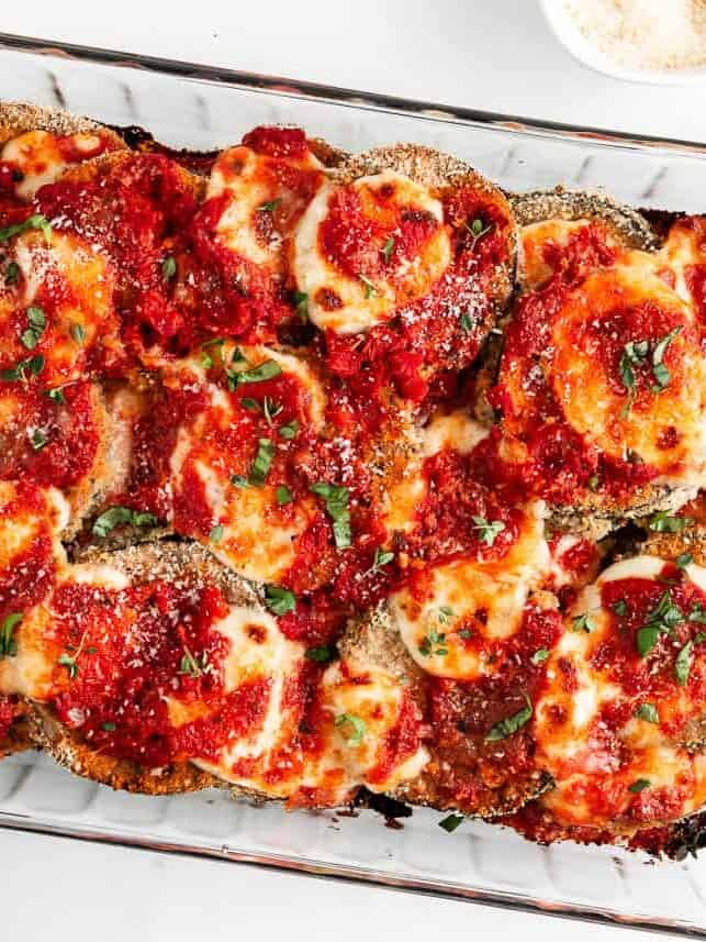Eggplant parmesan in a glass dish.
