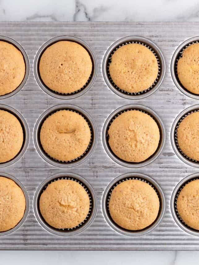 Apple pie cupcakes in muffin pan.