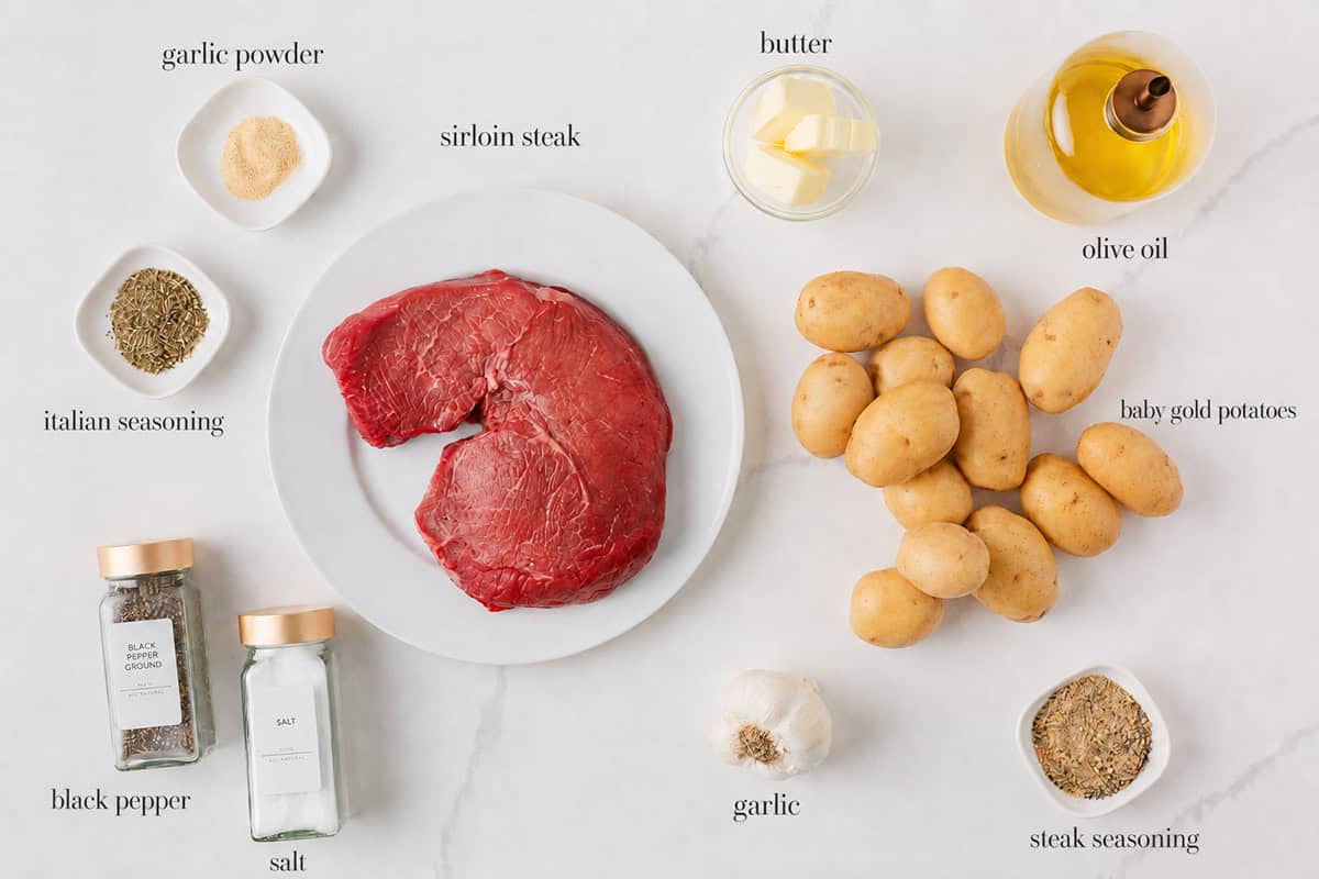Sirloin steak, baby gold potatoes, butter, olive oil, garlic and seasonings for garlic butter steak and potatoes.