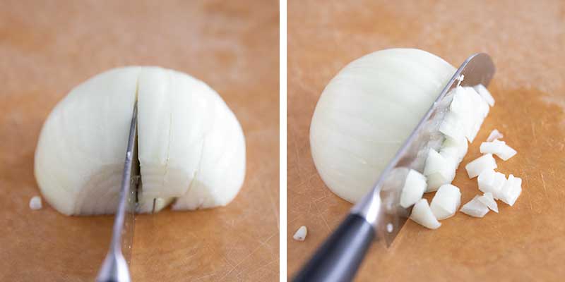 Dicing an onion with a knife.