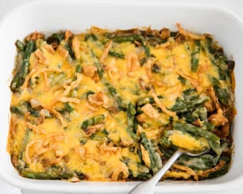 green bean casserole with cheese on top