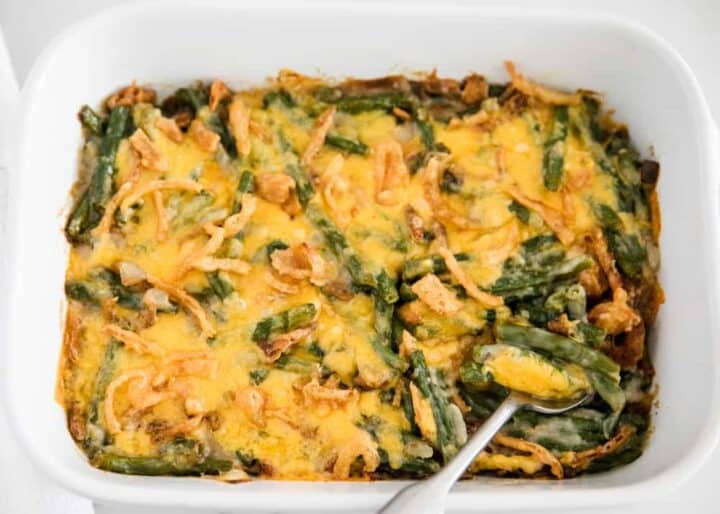 green bean casserole with cheese on top